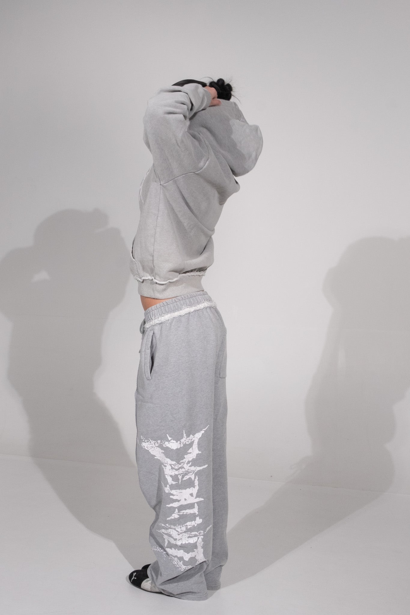 GREY CRACKED LOGO PANTS
