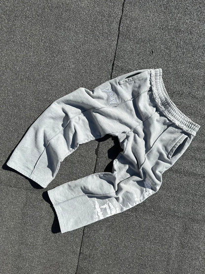 GREY CRACKED LOGO PANTS
