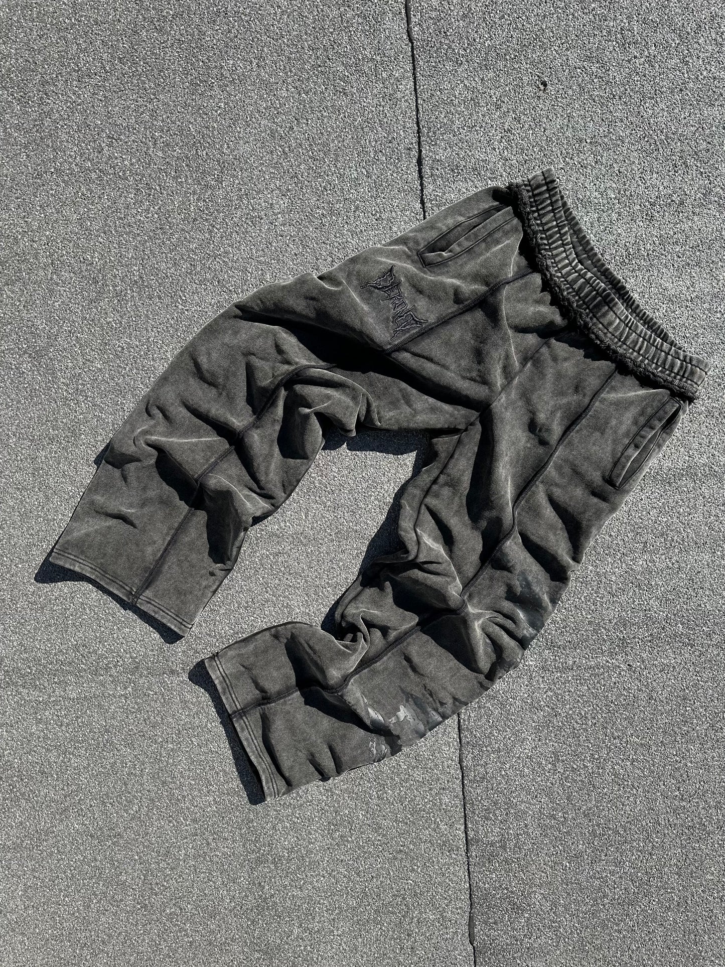 DARK GREY CRACKED LOGO PANTS