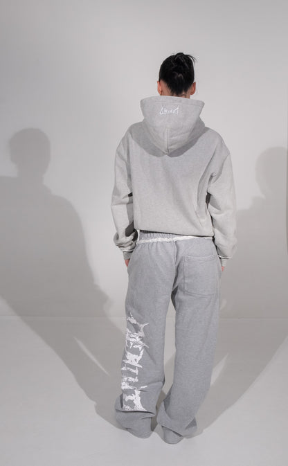 GREY CRACKED LOGO PANTS