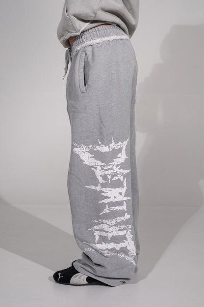 GREY CRACKED LOGO PANTS